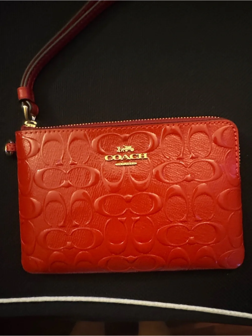 COACH Red Embossed Signature Wristlet with Gold Logo